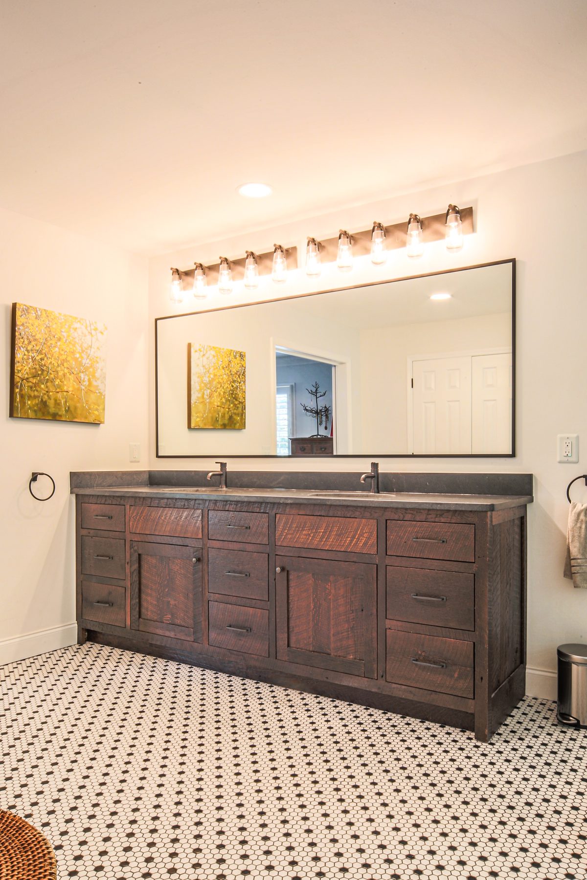 Reclaimed oak double vanity with a stone top